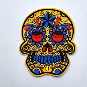 Orange-red and blue sugar skulls iron on patch dia de los muertos wearab…